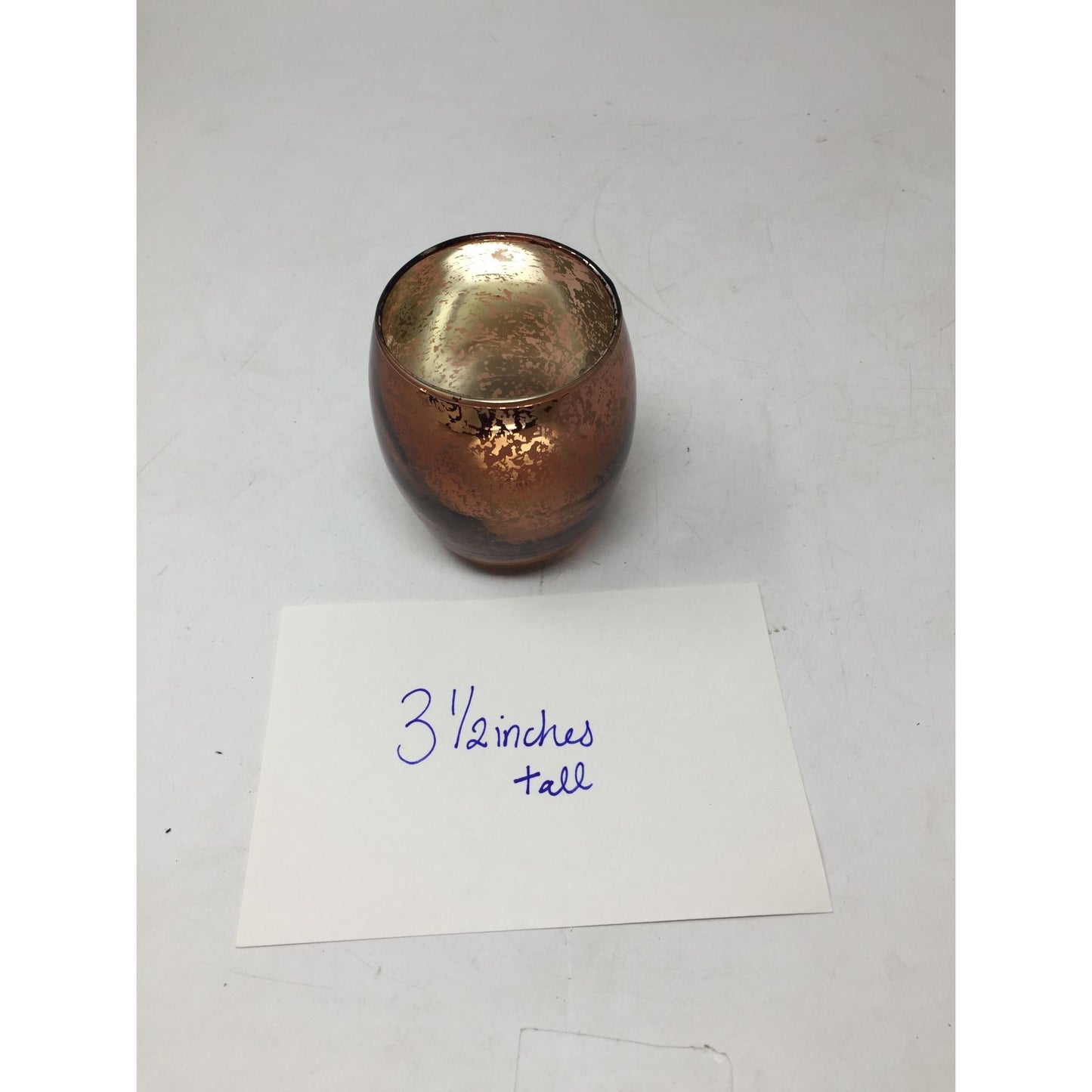 Copper Colored Candle Holder- about 3.5 inches tall