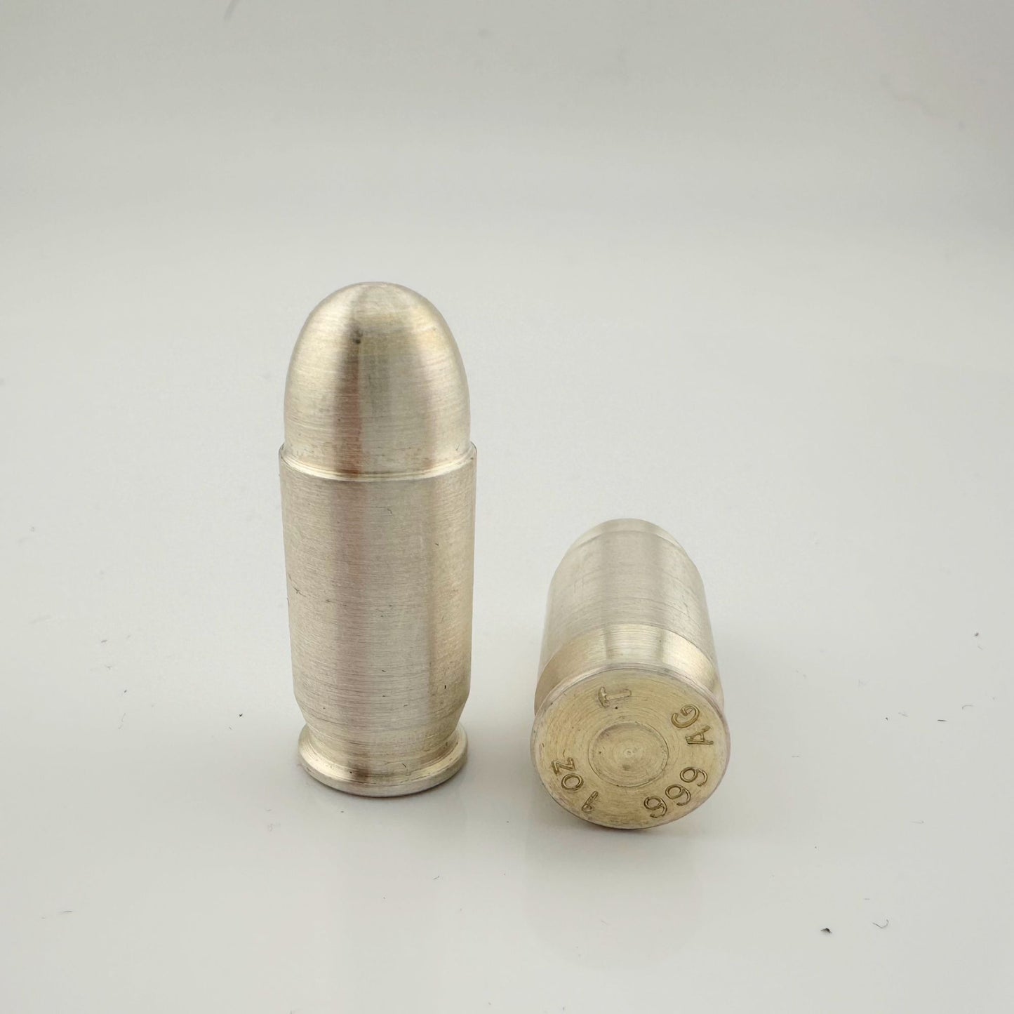 Two 1 Ounce .999 Fine Silver Bullets  in Stick to It Cartridge Holder