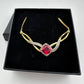 Elegant Lab Created Ruby and White Sapphire Infinite Loop Necklace