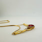 Elegant Lab Created Ruby and White Sapphire Infinite Loop Necklace