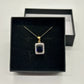 Beautiful 4 Carat Emerald Cut Blue Amethyst Pendant Heart Filagree Pattern Gold Overlay Sterling Silver