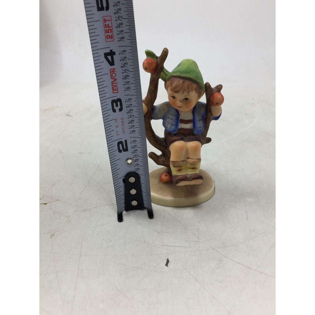 vintage Goebel Hummel "Apple Tree Boy" porcelain figurine (Model #142). A+ Stuff  A+ Stuff Figurines