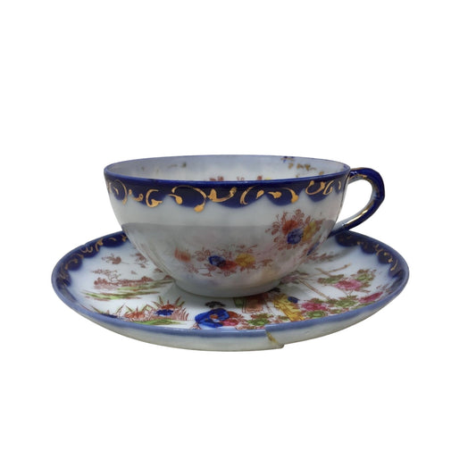 Vintage Hand Painted Asian/Japanese With Flowers Printed on it Tea Cup and Saucer Set