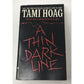 A Thin Dark Line by Tami Hoag Paperback Book