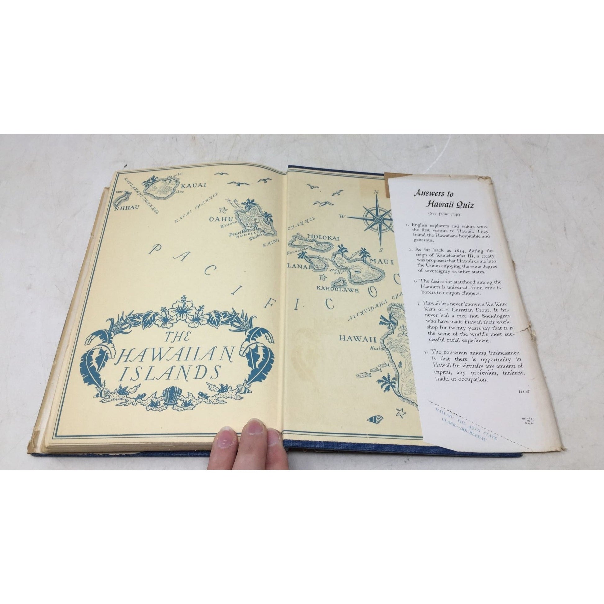 Vintage Hardcover Book Titled Hawaii: The 49th State written by Blake Clark and published around 1947. A+ Stuff  A+ Stuff Vintage Books