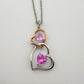 Beautiful Hearts Entwined 2 Tone Double Heart Necklace with Heart Shaped Gemstones