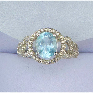Beautiful Floating Oval Natural Blue Topaz with Textured Detailing and Diamond Accent