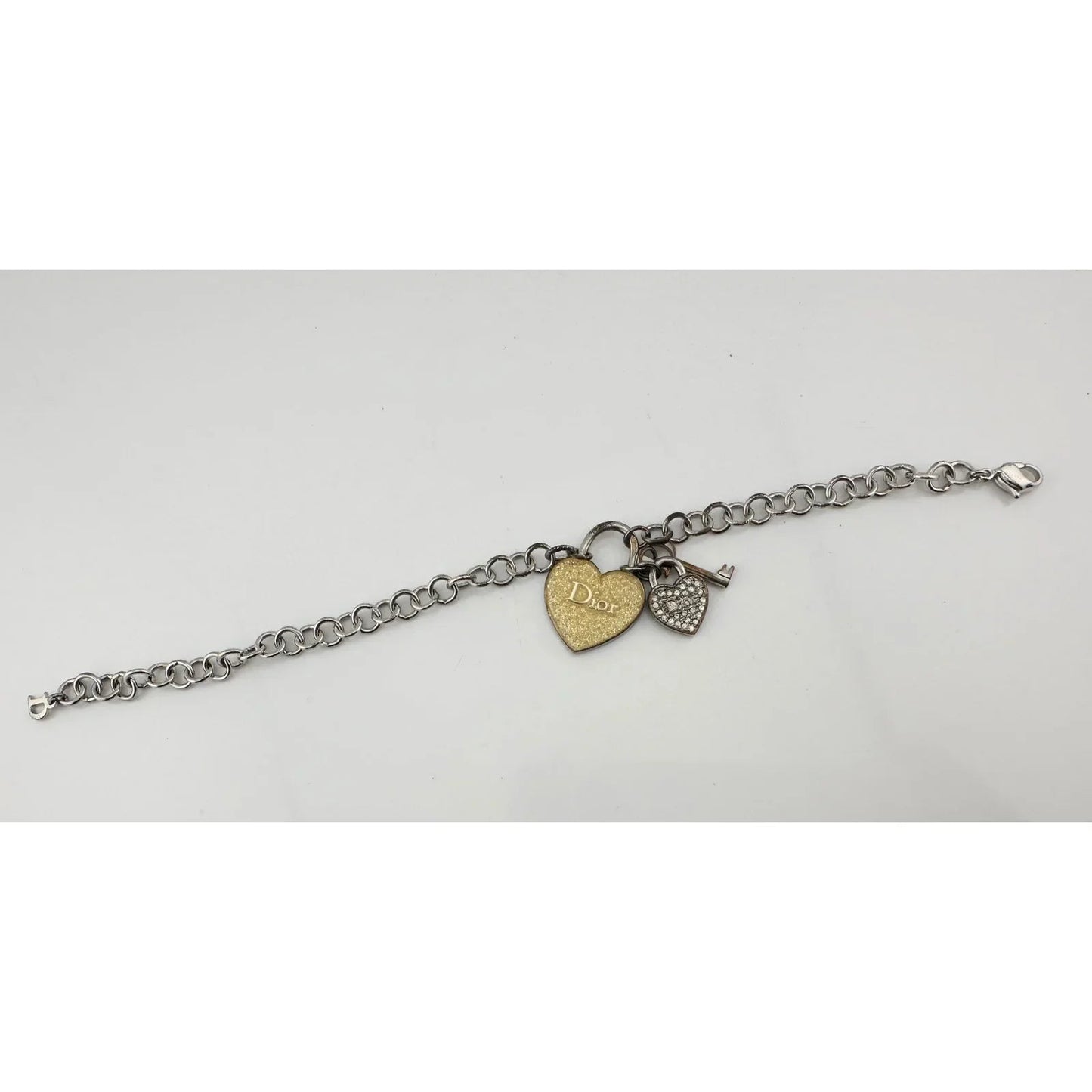 Christian Dior Silver Hear and Key Charm Bracelet with Dust Bag, Box & Documents - Christian Dior - Bracelet - A+ Stuff