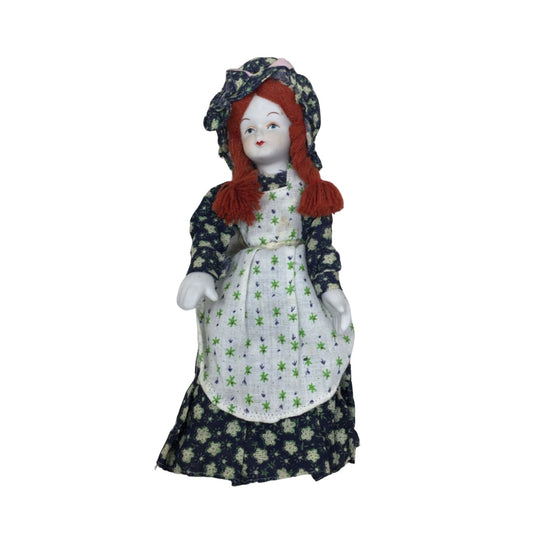 Vintage Porcelain Collectible Doll Wearing Floral Printed Dress With Red Braided Hair, Blue Eyes