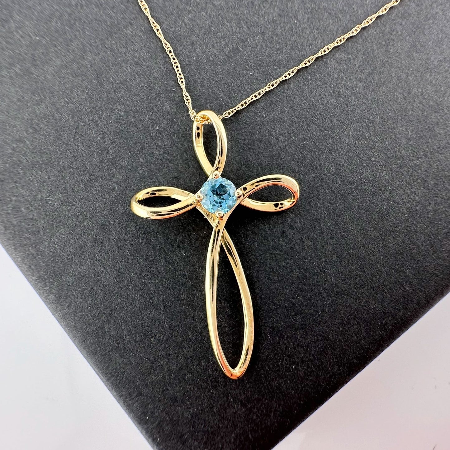 10 Kt Gold Cross Necklace - Beautiful Blue Topaz stone in Center with 10 Kt Gold Chain