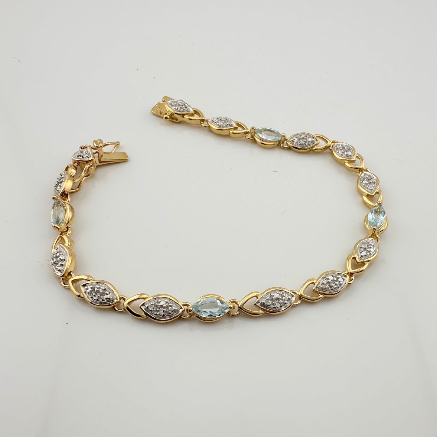 Blue Topaz Bracelet with Pretty Diamond Accents 14kt Gold Overlay Sterling Silver