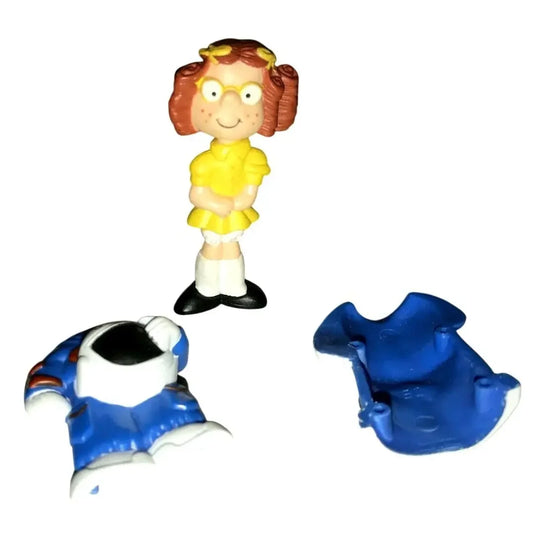 Cartoon girl toy figure in yellow with two disassembled blue astronaut suit pieces