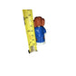 Small toy figure in blue outfit beside measuring tape showing height