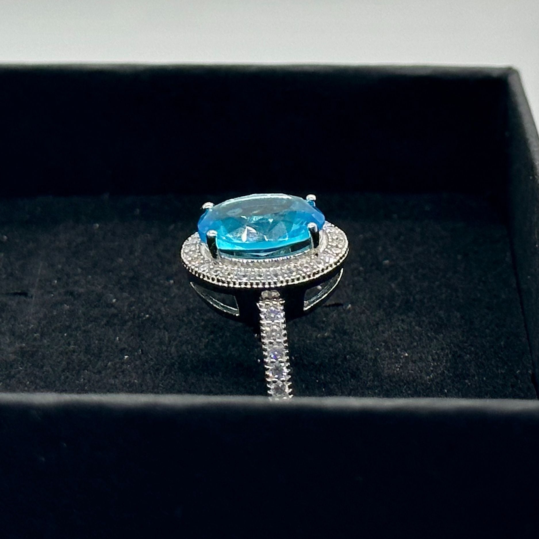 3/5 Carat (ctw) Blue Topaz Flower Ring in Sterling Silver