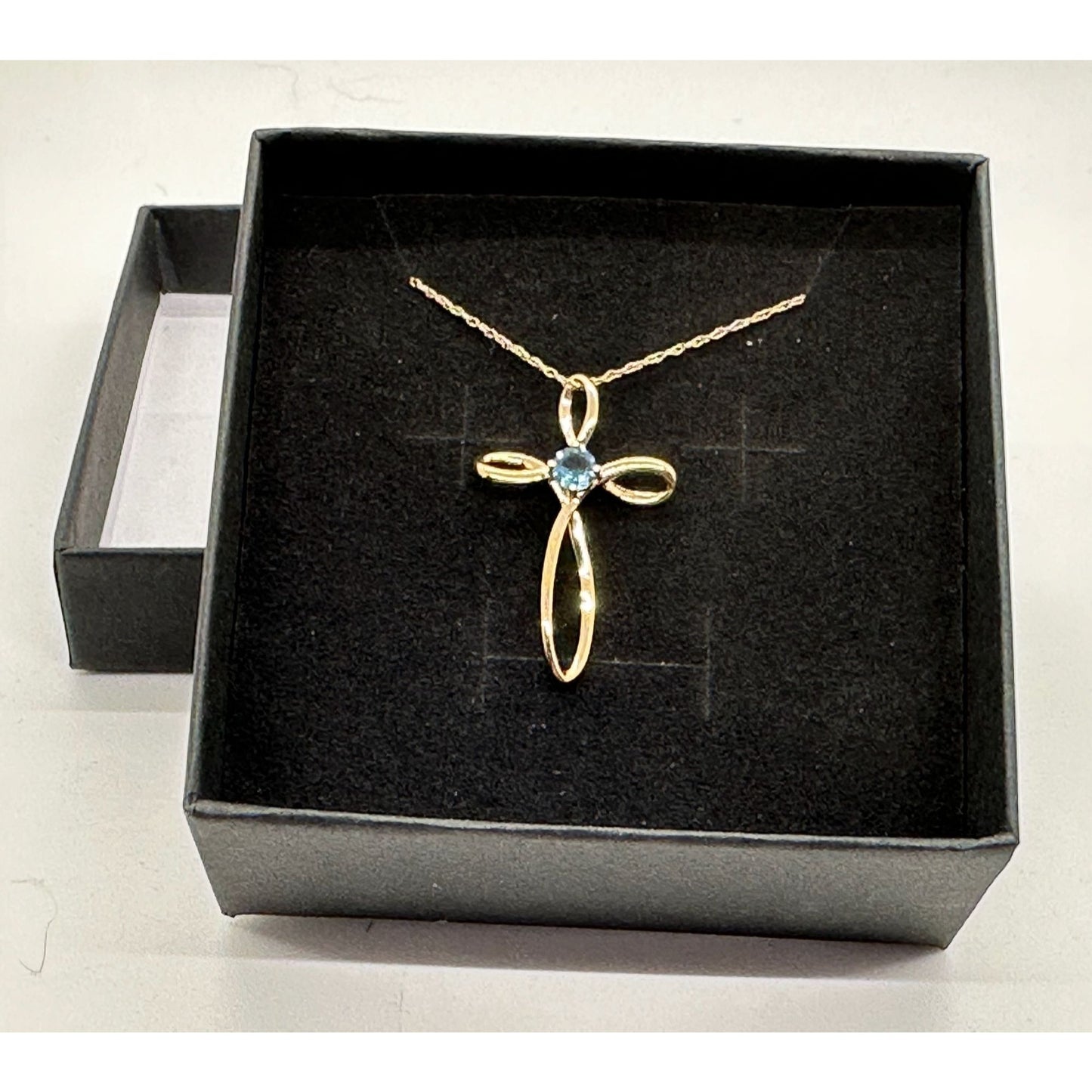 10 Kt Gold Cross Necklace - Beautiful Blue Topaz stone in Center with 10 Kt Gold Chain