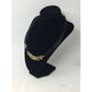 Women's Black Layered Rope Necklace with Gold and Silver Charms