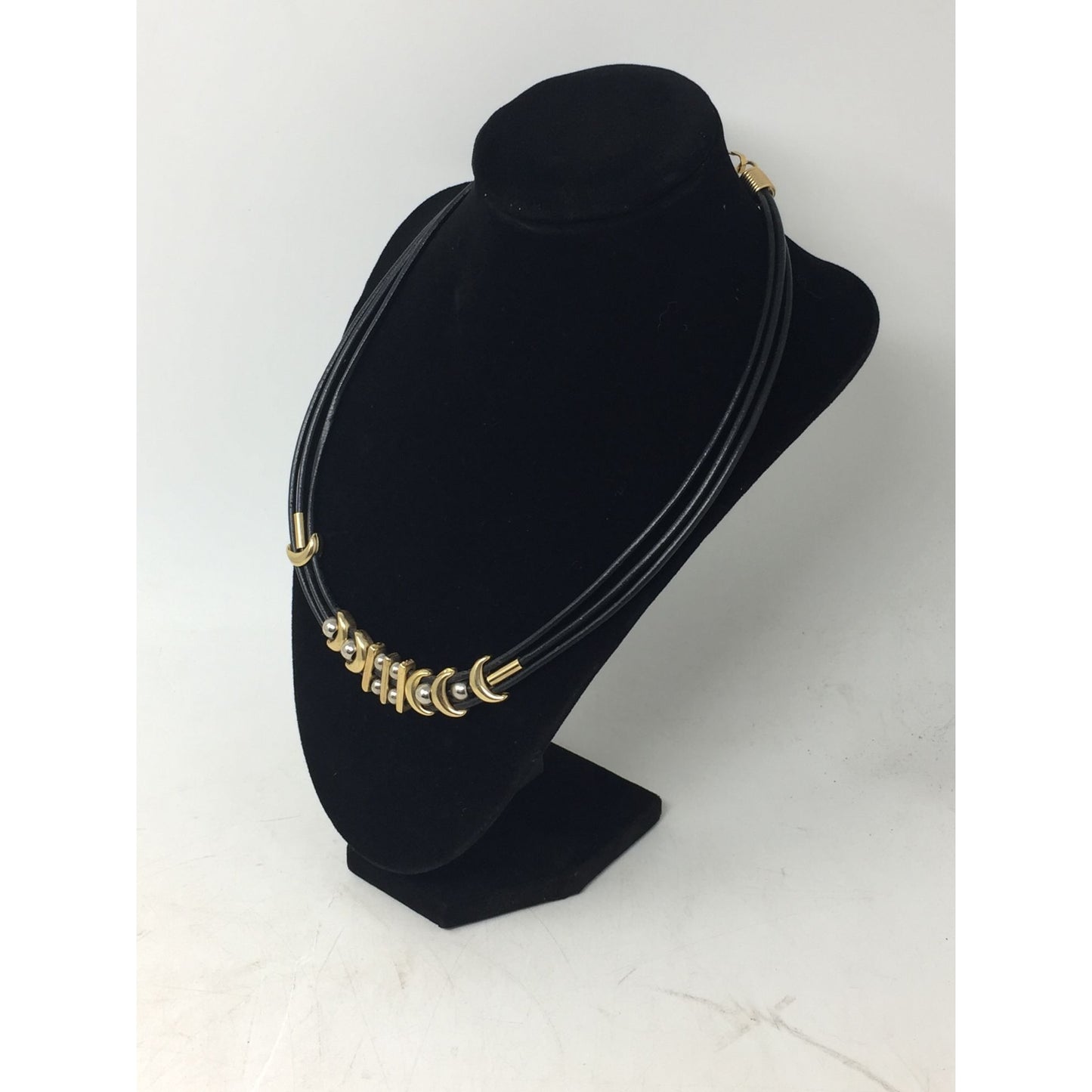 Women's Black Layered Rope Necklace with Gold and Silver Charms