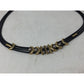 Women's Black Layered Rope Necklace with Gold and Silver Charms