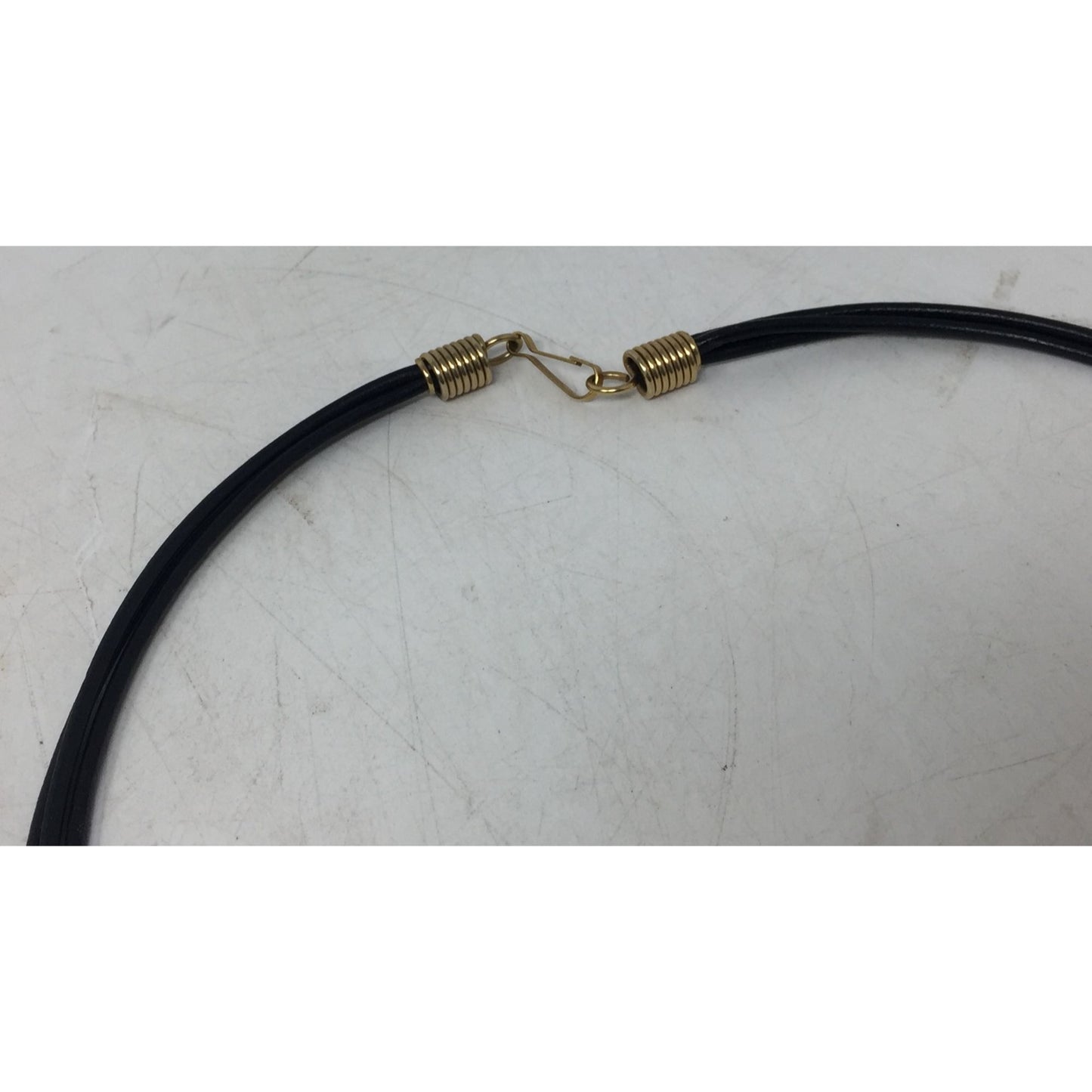 Women's Black Layered Rope Necklace with Gold and Silver Charms