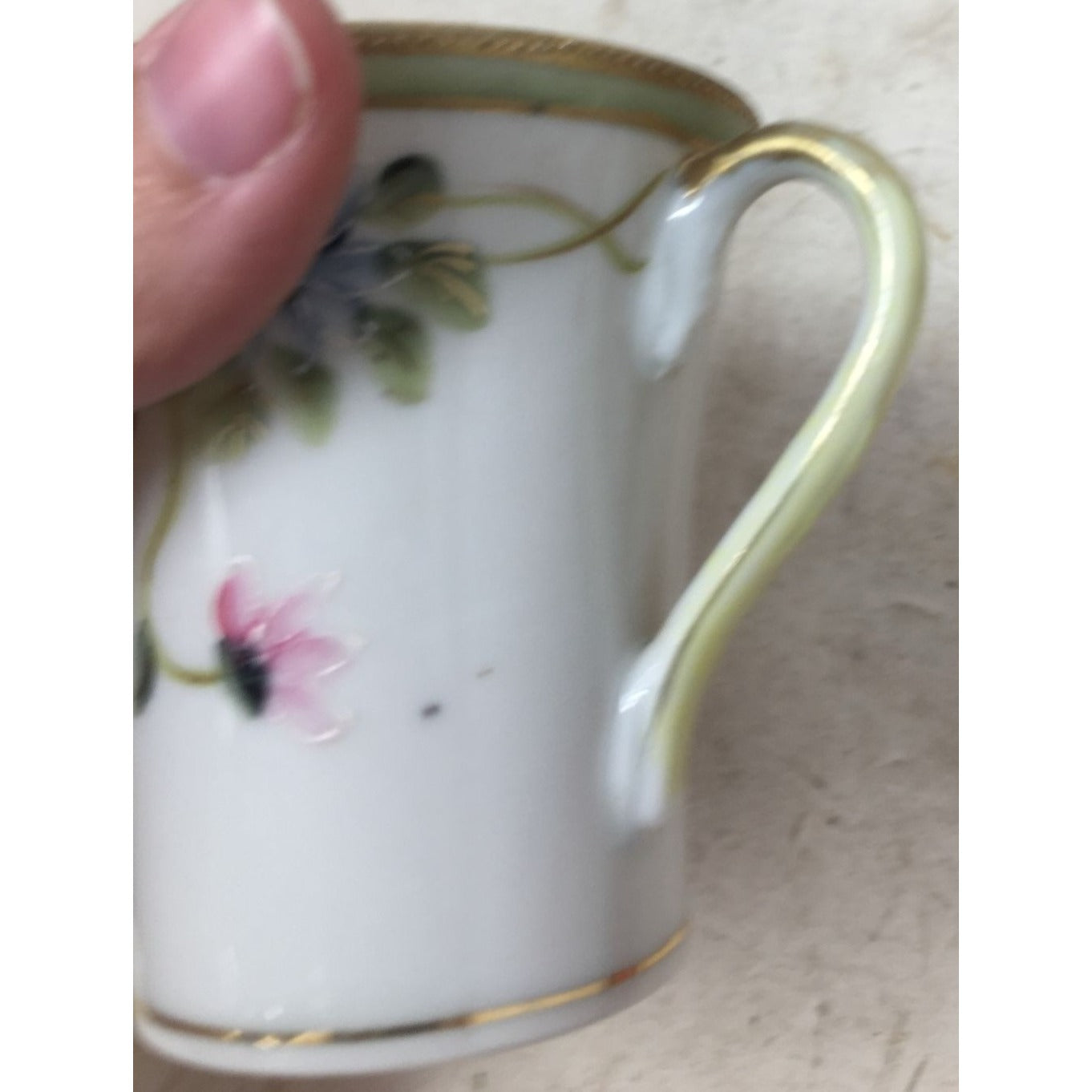 Small Handled Tea Cup with Floral Design and Gold /Green Rim