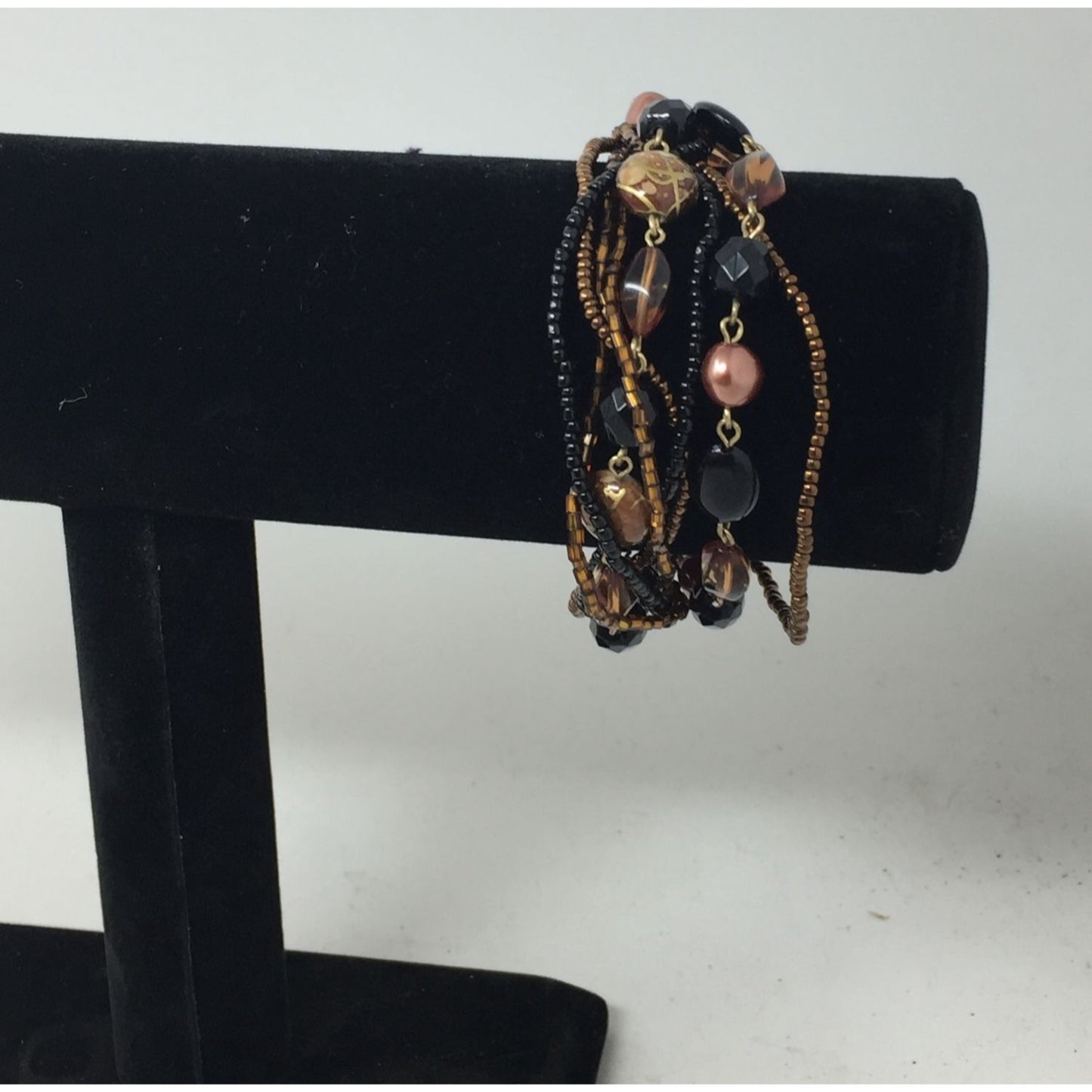 Lia Sophia Beautiful Gold Tone Multi Strand Bracelet with Brown/Black Beads