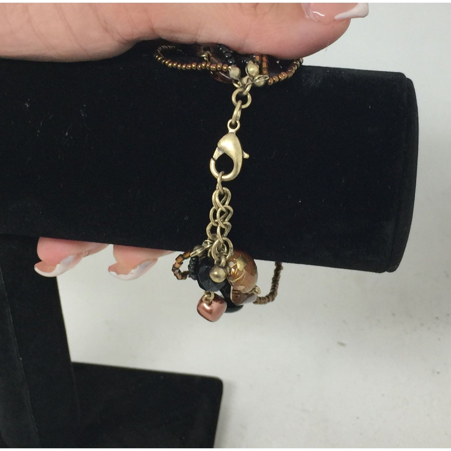 Lia Sophia Beautiful Gold Tone Multi Strand Bracelet with Brown/Black Beads