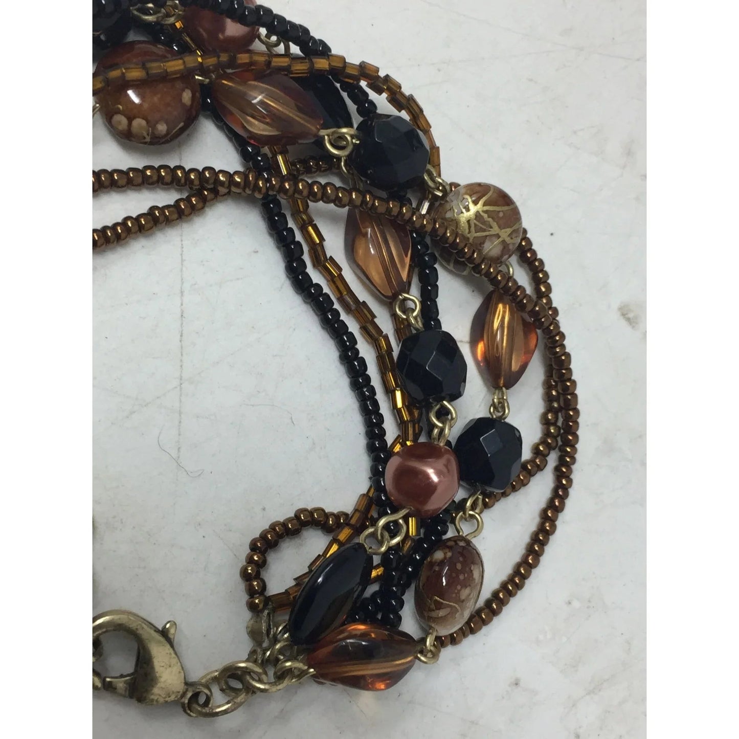 Lia Sophia Beautiful Gold Tone Multi Strand Bracelet with Brown/Black Beads - Lia Sophia - Bracelet - A+ Stuff