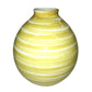 Round yellow and white striped ceramic vase on white background