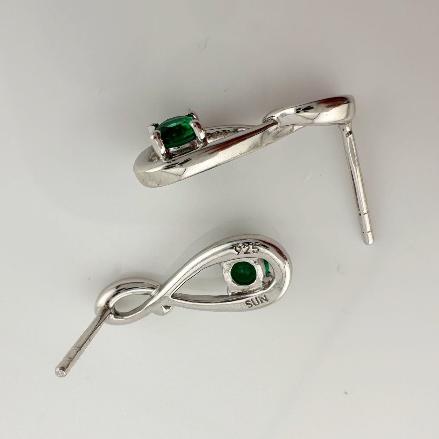 Beautiful Round Emerald Swoop Earrings in Sterling Silver