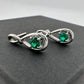 Beautiful Round Emerald Swoop Earrings in Sterling Silver