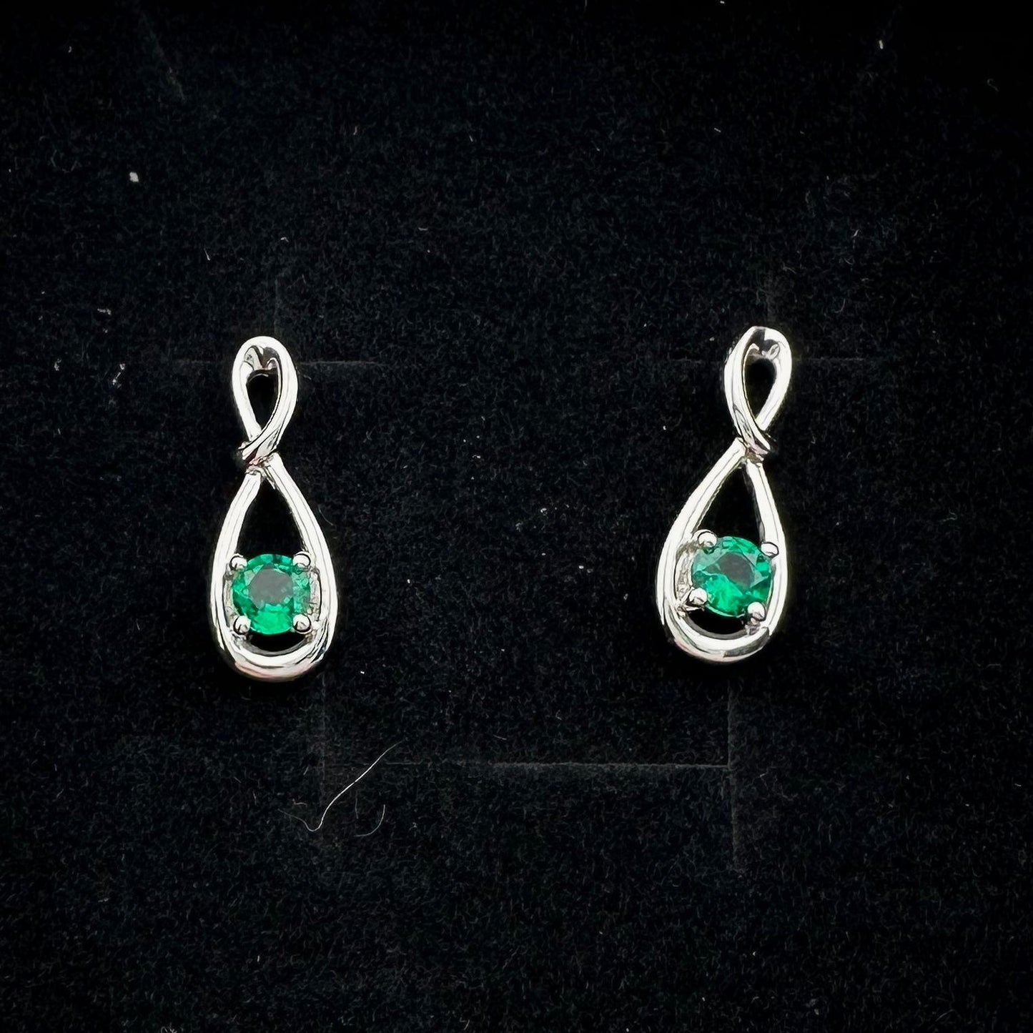 Beautiful Round Emerald Swoop Earrings in Sterling Silver