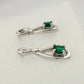 Beautiful Round Emerald Swoop Earrings in Sterling Silver