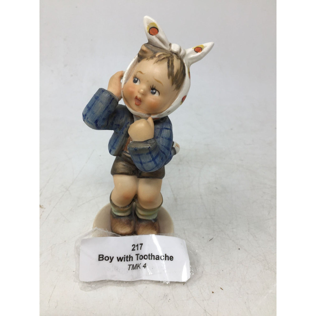 M.I. Hummel "Boy with Toothache" Porcelain Figurine A+ Stuff  A+ Stuff Figurines