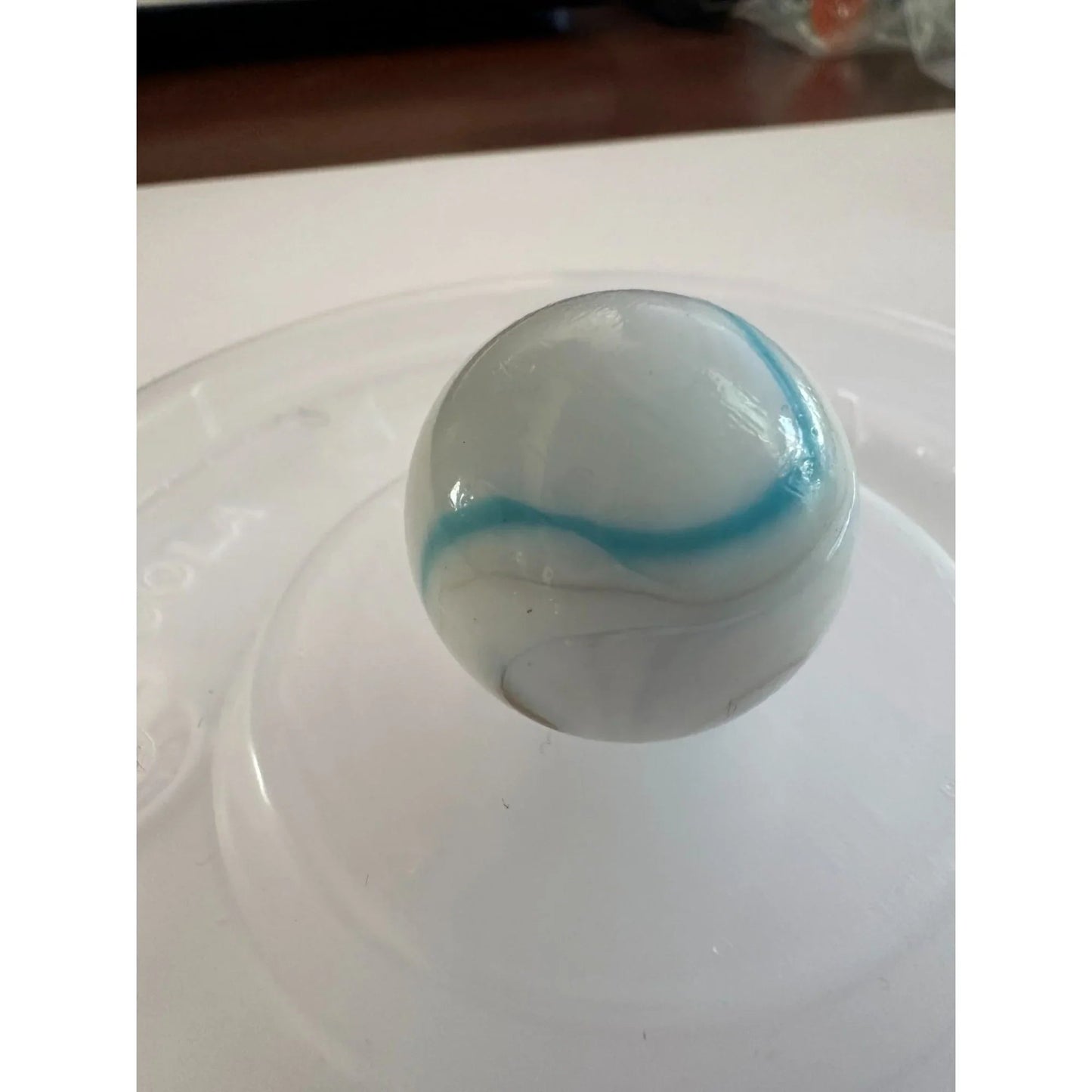 Two Vintage Milky White Shooter Marbles with Blue and Orange Stripes on them - A+ Stuff - Collectibles - A+ Stuff