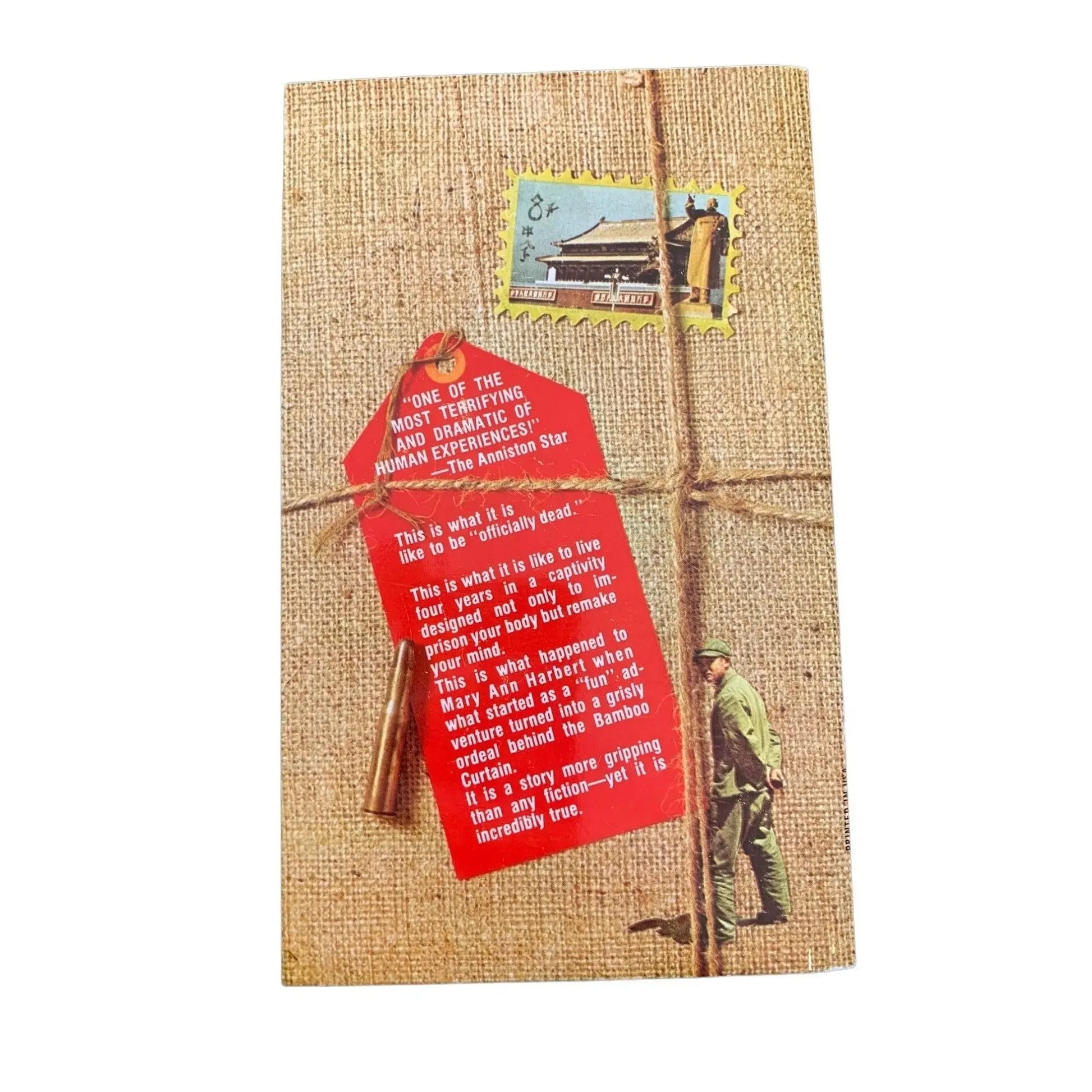Book cover with burlap texture, soldier illustration, postage stamp, and red tag with text