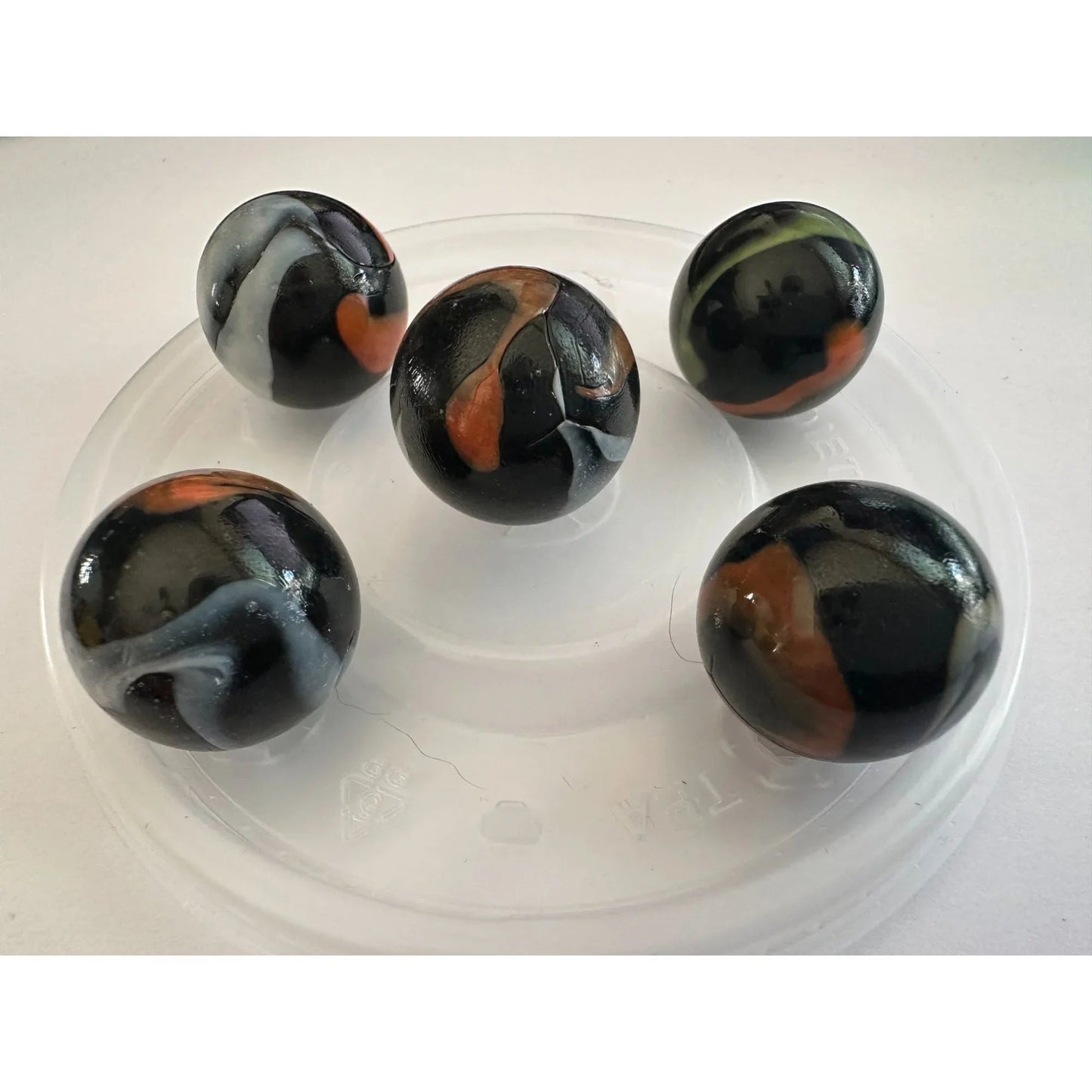 VINTAGE BLACK SHOOTER MARBLES WITH WHITE, YELLOW AND ORANGE SWIRLS - A+ Stuff - Collectibles - A+ Stuff
