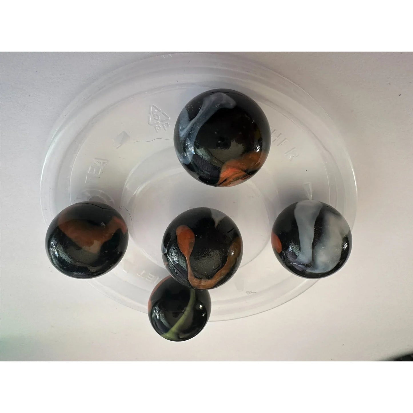 VINTAGE BLACK SHOOTER MARBLES WITH WHITE, YELLOW AND ORANGE SWIRLS - A+ Stuff - Collectibles - A+ Stuff