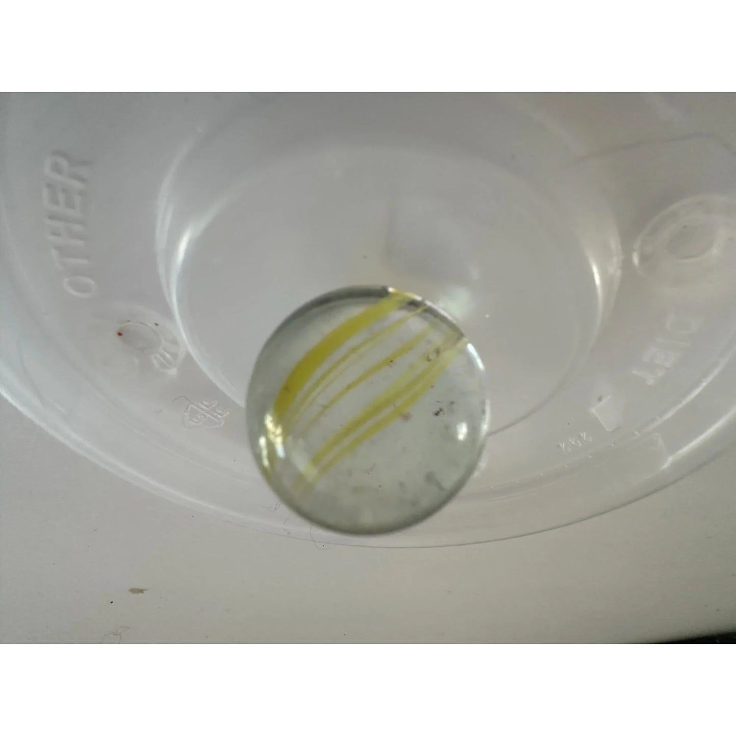 Vintage Clear Glass Shooter Marbles with Yellow and Orange Swirl Design - A+ Stuff - Collectibles - A+ Stuff