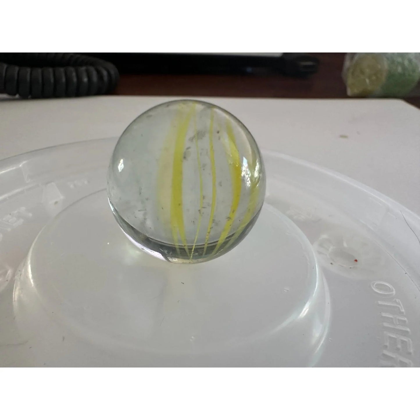 Vintage Clear Glass Shooter Marbles with Yellow and Orange Swirl Design - A+ Stuff - Collectibles - A+ Stuff