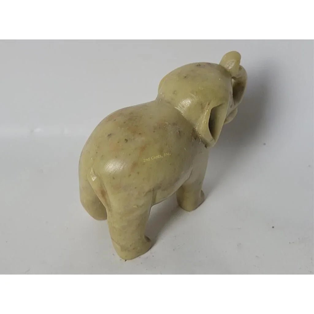 Vintage Hand Carved Miniature Elephant with its Trunk Up Figurine - A+ Stuff