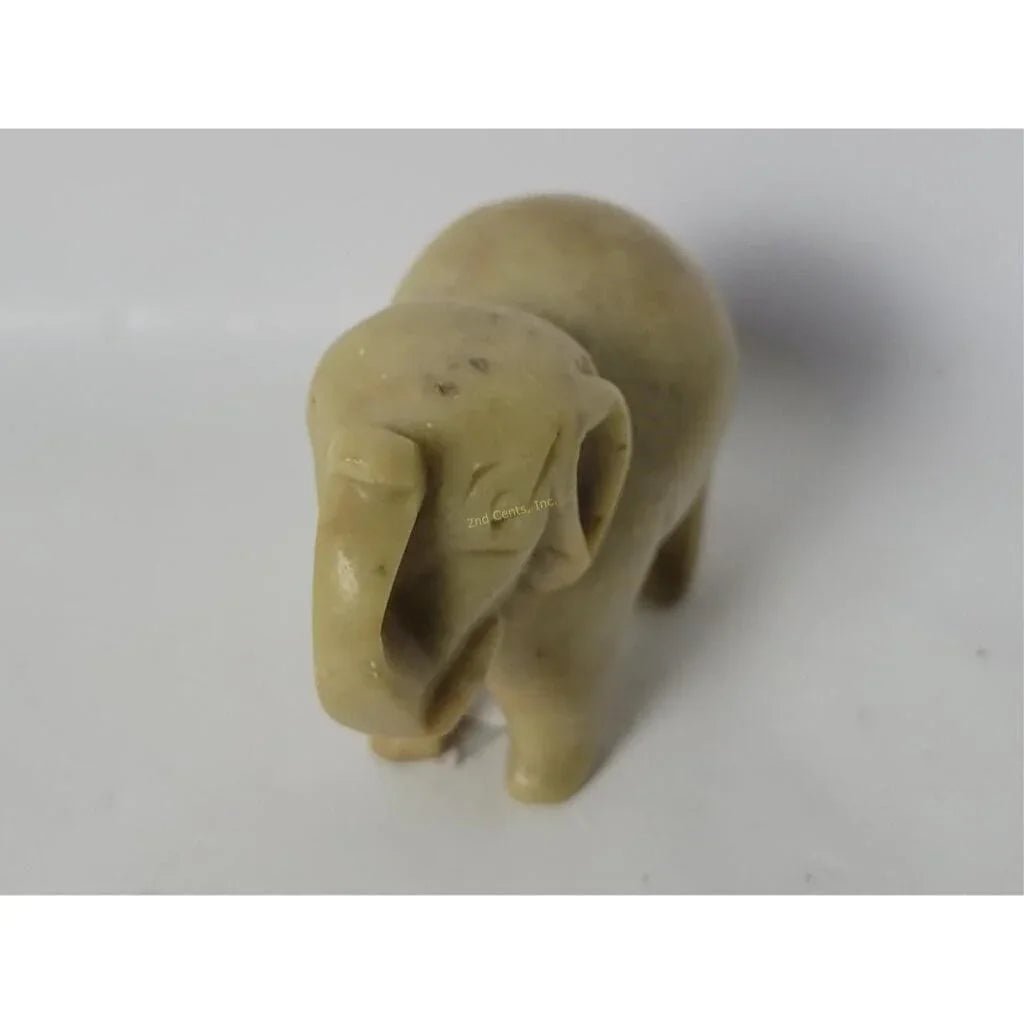 Vintage Hand Carved Miniature Elephant with its Trunk Up Figurine - A+ Stuff