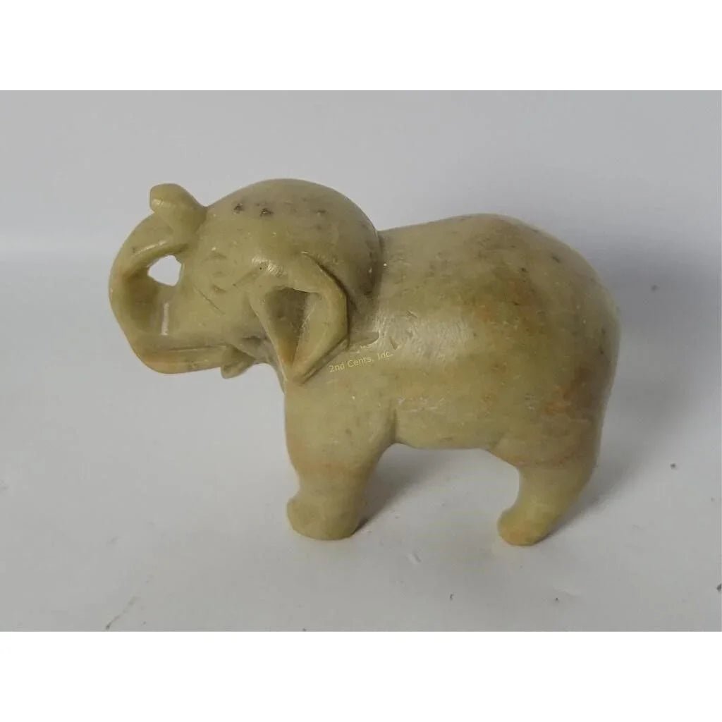 Vintage Hand Carved Miniature Elephant with its Trunk Up Figurine - A+ Stuff