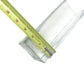 Measuring rectangular clear glass vase with tape measure on white background
