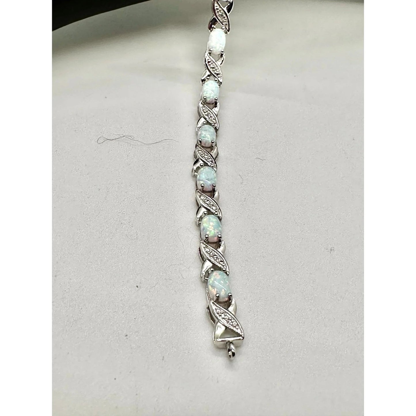 XO Infinity Bracelet Lab Created Opal and Diamond Accent in Sterling Silver Setting - Stunning Gemstones - A+ Stuff