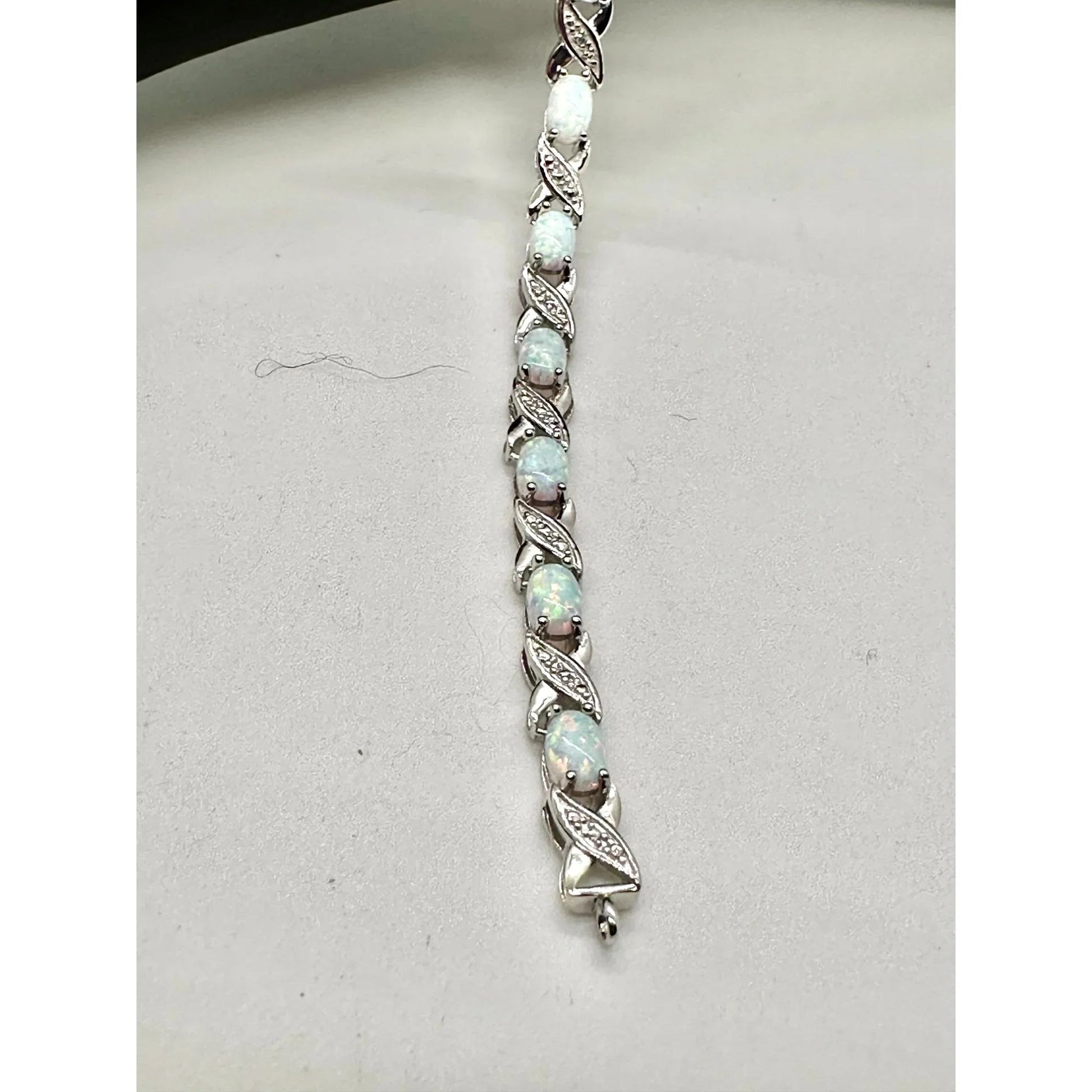 XO Infinity Bracelet Lab Created Opal and Diamond Accent in Sterling Silver Setting - Stunning Gemstones - A+ Stuff