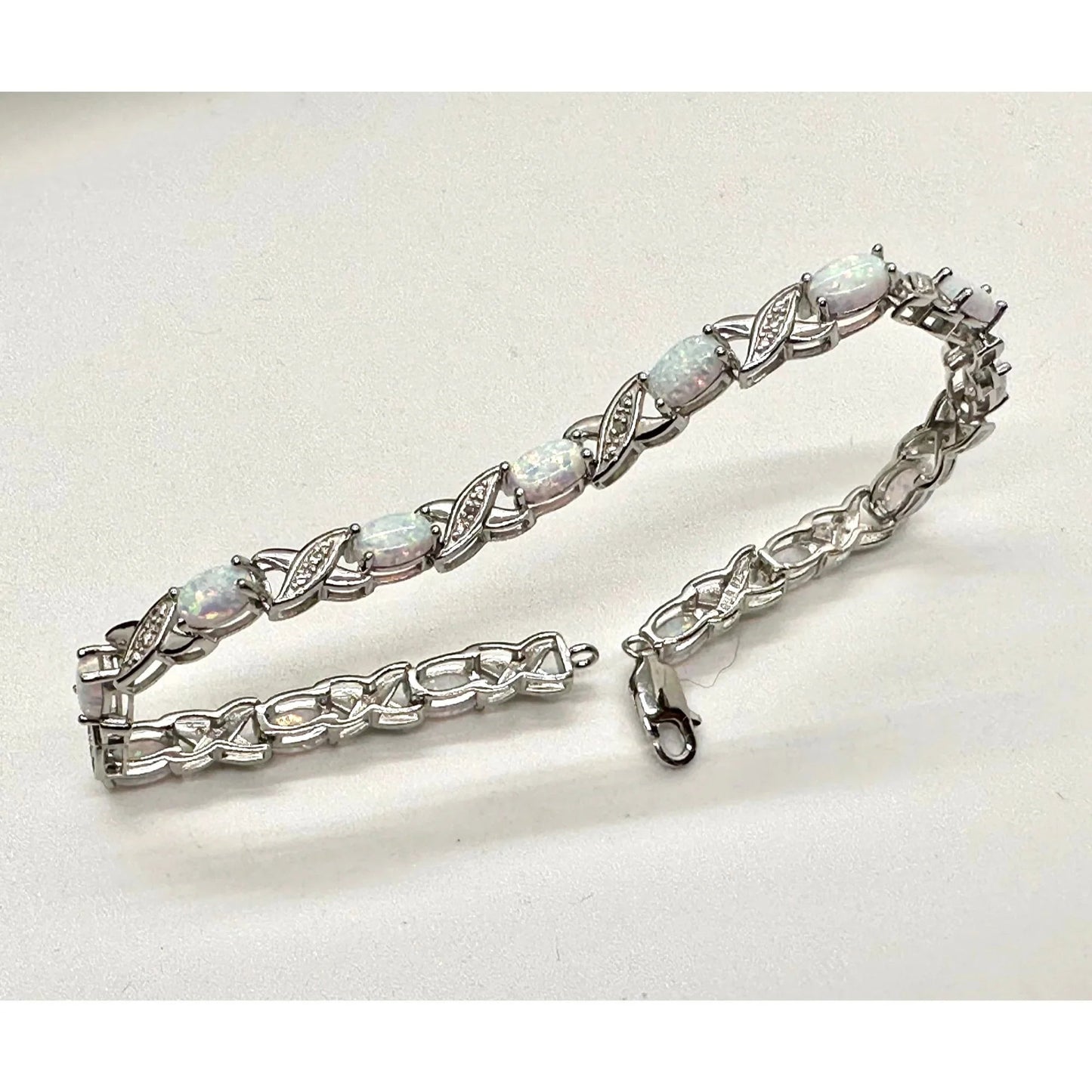 XO Infinity Bracelet Lab Created Opal and Diamond Accent in Sterling Silver Setting - Stunning Gemstones - A+ Stuff