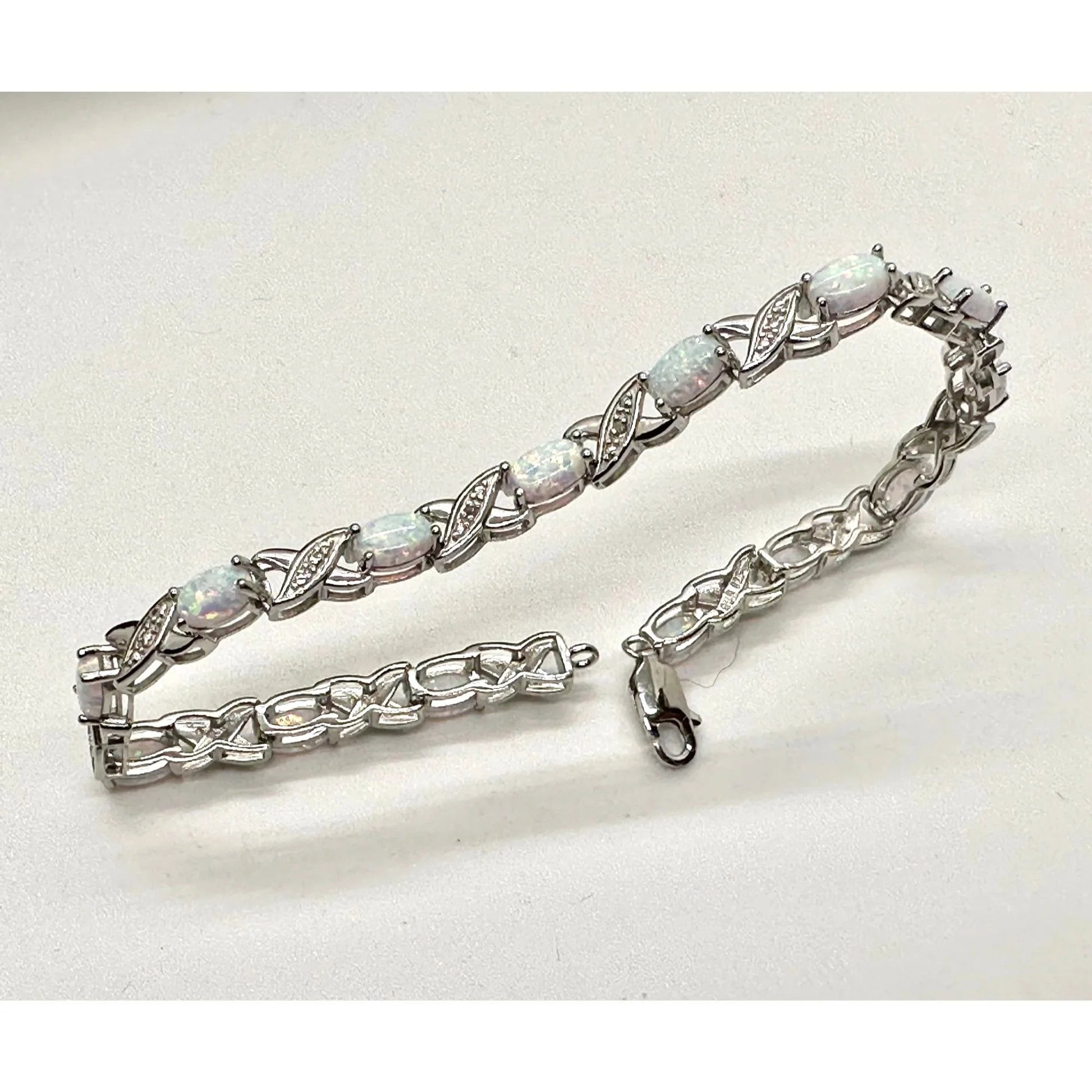 XO Infinity Bracelet Lab Created Opal and Diamond Accent in Sterling Silver Setting - Stunning Gemstones - A+ Stuff