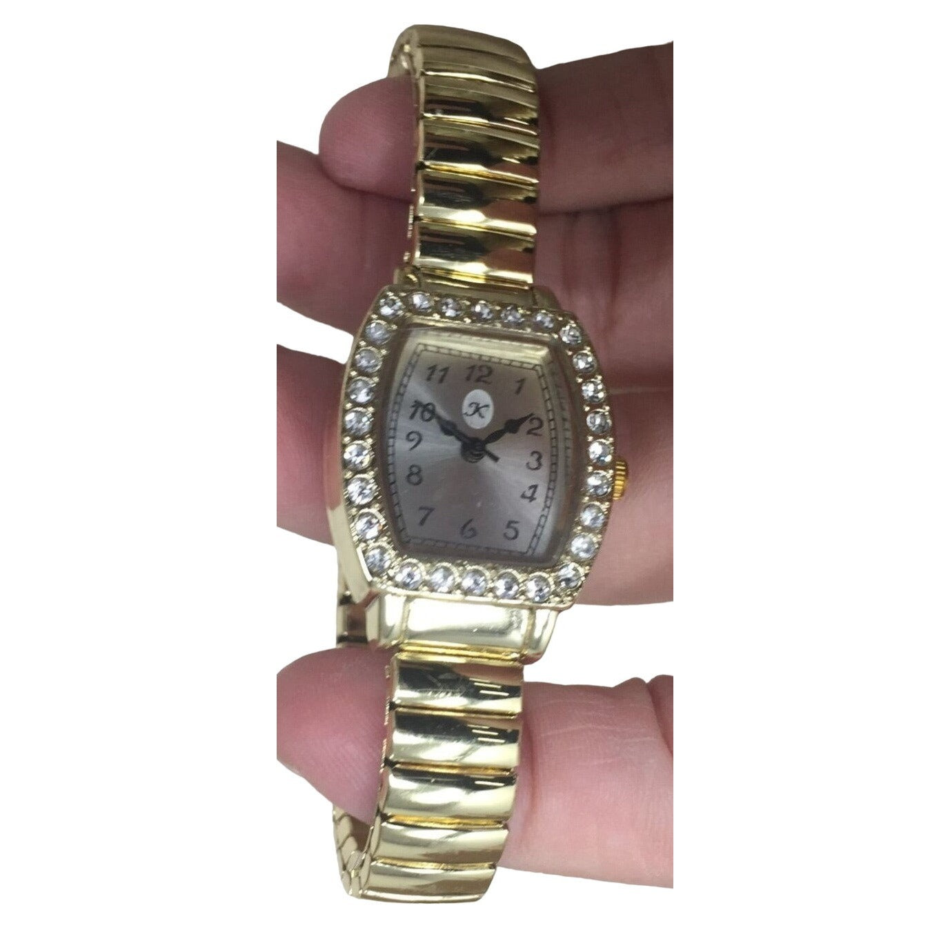 Gold Tone Women's Wristwatch with rhinestones around face - Nice style