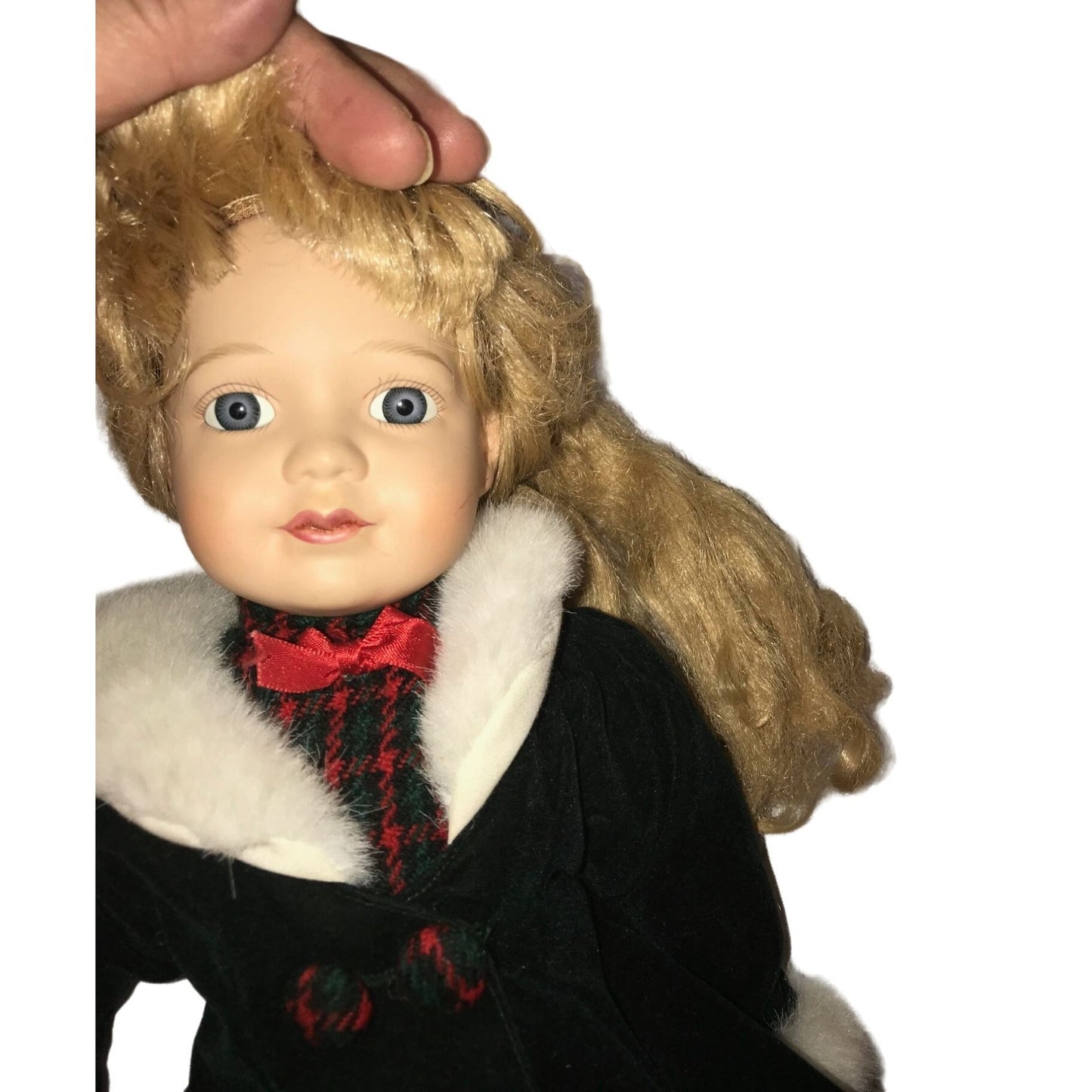 Holidays Porcelain Doll - Blonde Girl in long green jacket with red accents and white fur collar - Winter themed collectible doll