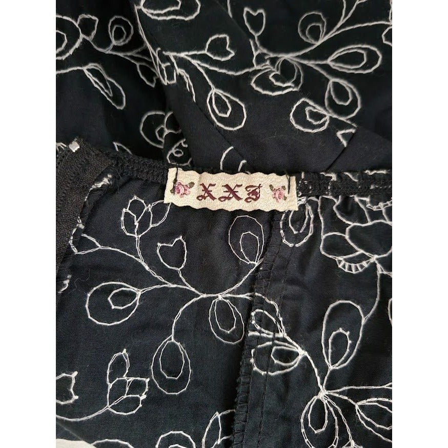 Womens black cocktail dress with pretty white embroidered floral lines - size Medium